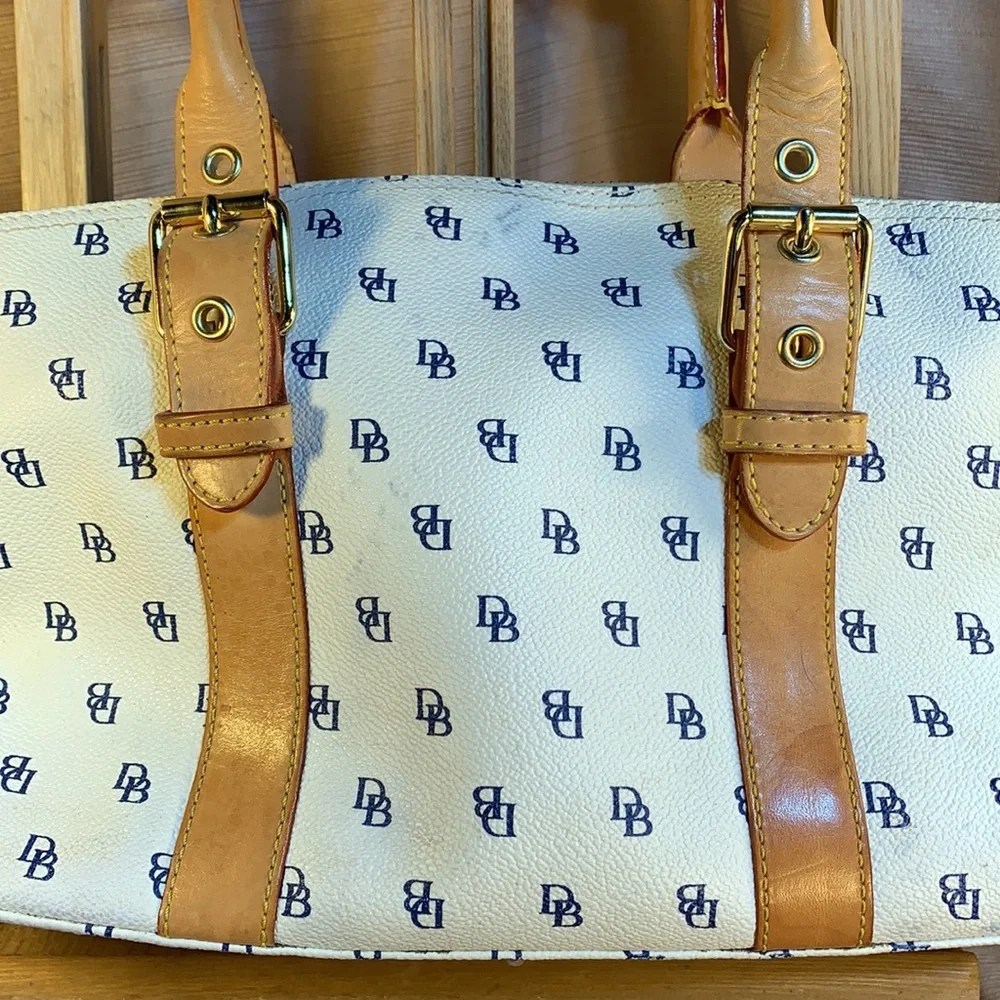 Dooney & Bourke leather satchel w/logo pattern